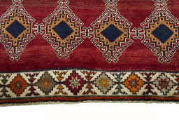 Central medallion detail of 2000s Persian Gabbeh rug from Iran / Persia
