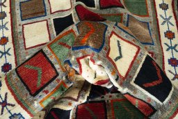 Close-up detail of 2000s Persian Gabbeh rug from Iran / Persia showing Wool weave
