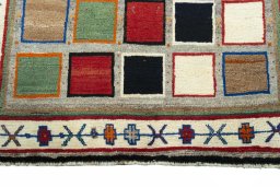 Central medallion detail of 2000s Persian Gabbeh rug from Iran / Persia