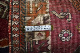 Close-up detail of 2000s Persian Gabbeh rug from Iran / Persia showing Wool weave