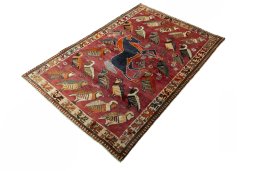 Corner detail of 2000s Persian Gabbeh rug showing border pattern and Wool pile