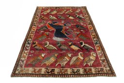 Surface texture of 2000s Persian Gabbeh rug with natural Wool and intricate pattern