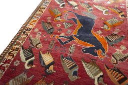 Backside of handmade 2000s Persian Gabbeh rug showing knot structure and weave density