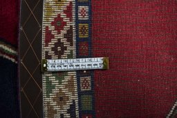 Close-up detail of 2000s Persian Gabbeh rug from Iran / Persia showing Wool weave