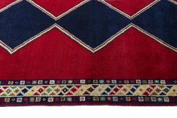 Close-up detail of 2000s Persian Gabbeh rug from Iran / Persia showing Wool weave