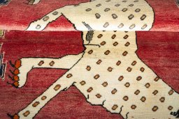 Full view of 2000s Persian Gabbeh rug from Iran / Persia, 195 × 120 cm in Red tones