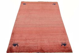 Surface texture of 2000s Persian Gabbeh rug with natural Wool and intricate pattern