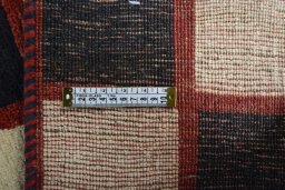 Close-up detail of 2000s Persian Gabbeh rug from Iran / Persia showing Wool weave