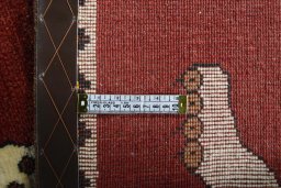 Close-up detail of 2000s Persian Gabbeh rug from Iran / Persia showing Wool weave