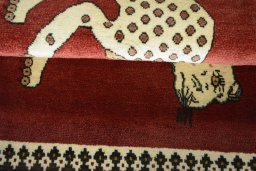 Full view of 2000s Persian Gabbeh rug from Iran / Persia, 118 × 85 cm in Red tones
