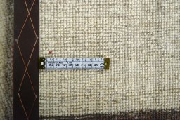Close-up detail of New Persian Gabbeh rug from Iran / Persia showing Wool weave