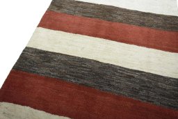 Backside of handmade New Persian Gabbeh rug showing knot structure and weave density