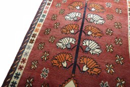 Backside of handmade 2000s Persian Gabbeh rug showing knot structure and weave density