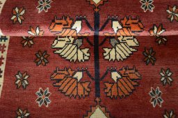 Full view of 2000s Persian Gabbeh rug from Iran / Persia, 145 × 92 cm in Red tones