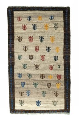 Full view of 2000s Persian Gabbeh rug from Iran / Persia, 135 × 81 cm in Beige tones
