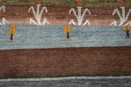 Close-up detail of 2000s Persian Gabbeh rug from Iran / Persia showing Wool weave