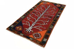 Corner detail of 2000s Persian Gabbeh rug showing border pattern and Wool pile