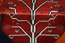 Full view of 2000s Persian Gabbeh rug from Iran / Persia, 203 × 115 cm in Red tones