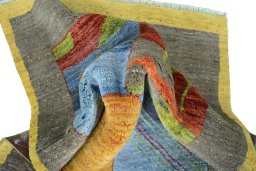 Corner detail of New Persian Gabbeh rug showing border pattern and Wool pile