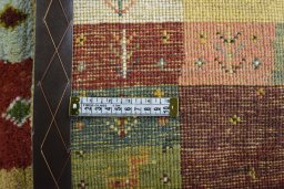 Close-up detail of New Persian Gabbeh rug from Iran / Persia showing Wool weave