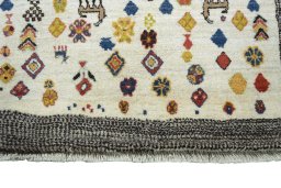 Central medallion detail of 2000s Persian Gabbeh rug from Iran / Persia