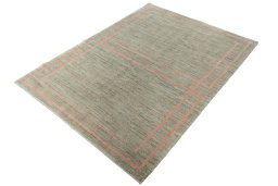 Corner detail of New Persian Gabbeh rug showing border pattern and Wool pile