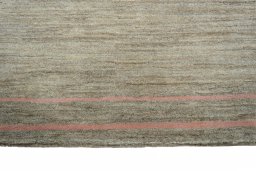 Backside of handmade New Persian Gabbeh rug showing knot structure and weave density