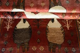 Full view of 2000s Persian Gabbeh rug from Iran / Persia, 210 × 110 cm in Red tones