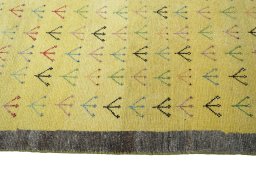 Close-up detail of 2000s Persian Gabbeh rug from Iran / Persia showing Wool weave