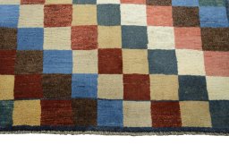 Central medallion detail of 2000s Persian Gabbeh rug from Iran / Persia