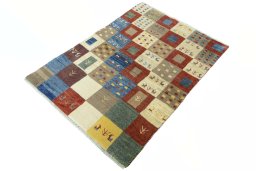 Corner detail of New Persian Gabbeh rug showing border pattern and Wool pile