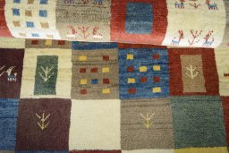 Full view of New Persian Gabbeh rug from Iran / Persia, 140 × 100 cm in Multi Color tones