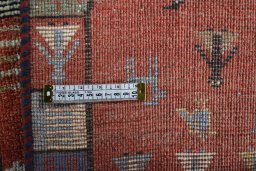 Close-up detail of 2000s Persian Gabbeh rug from Iran / Persia showing Wool weave