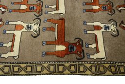 Close-up detail of 2000s Persian Gabbeh rug from Iran / Persia showing Wool weave