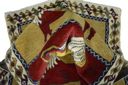 Corner detail of 2000s Persian Gabbeh rug showing border pattern and Wool pile