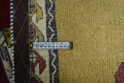 Close-up detail of 2000s Persian Gabbeh rug from Iran / Persia showing Wool weave