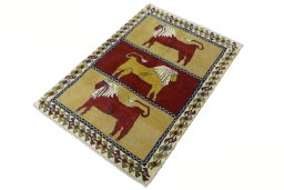 Corner detail of 2000s Persian Gabbeh rug showing border pattern and Wool pile