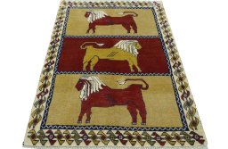 Surface texture of 2000s Persian Gabbeh rug with natural Wool and intricate pattern