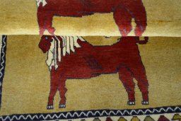 Full view of 2000s Persian Gabbeh rug from Iran / Persia, 153 × 105 cm in Yellow tones