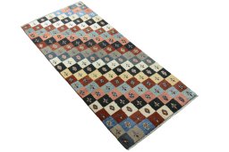 Close-up detail of 2000s Persian Gabbeh rug from Iran / Persia showing Wool weave