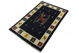 Corner detail of New Persian Gabbeh rug showing border pattern and Wool pile