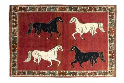 Full view of 2000s Persian Gabbeh rug from Iran / Persia, 198 × 135 cm in Red tones