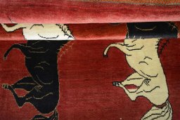 Full view of 2000s Persian Gabbeh rug from Iran / Persia, 198 × 135 cm in Red tones