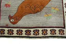 Central medallion detail of 2000s Persian Gabbeh rug from Iran / Persia