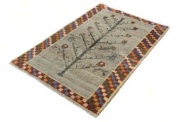 Corner detail of New Persian Gabbeh rug showing border pattern and Wool pile