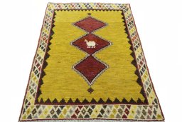 Surface texture of 2000s Persian Gabbeh rug with natural Wool and intricate pattern