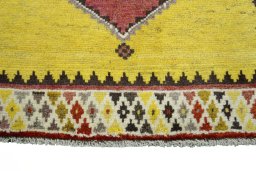 Central medallion detail of 2000s Persian Gabbeh rug from Iran / Persia
