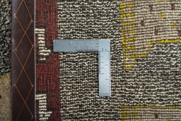 Close-up detail of 2000s Persian Gabbeh rug from Iran / Persia showing Wool weave