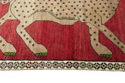 Close-up detail of 2000s Persian Gabbeh rug from Iran / Persia showing Wool weave
