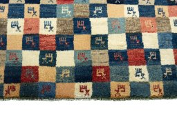 Central medallion detail of 2000s Persian Gabbeh rug from Iran / Persia